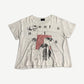 Enfants Riches Deprimes cream tee with cut-letter enfants grid, penguin photo collage and 79 numerals.