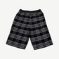 Chrome Hearts After School flannel shorts back view, plaid weave with stitched leather trim accents