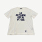 Louis Vuitton Le Monde Est A Vous white tee with small navy LV monogram chest print