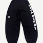 GV Gallery Raspberry Hills black weekday sweatpants front view with drawstring waist and tonal logo on thigh.