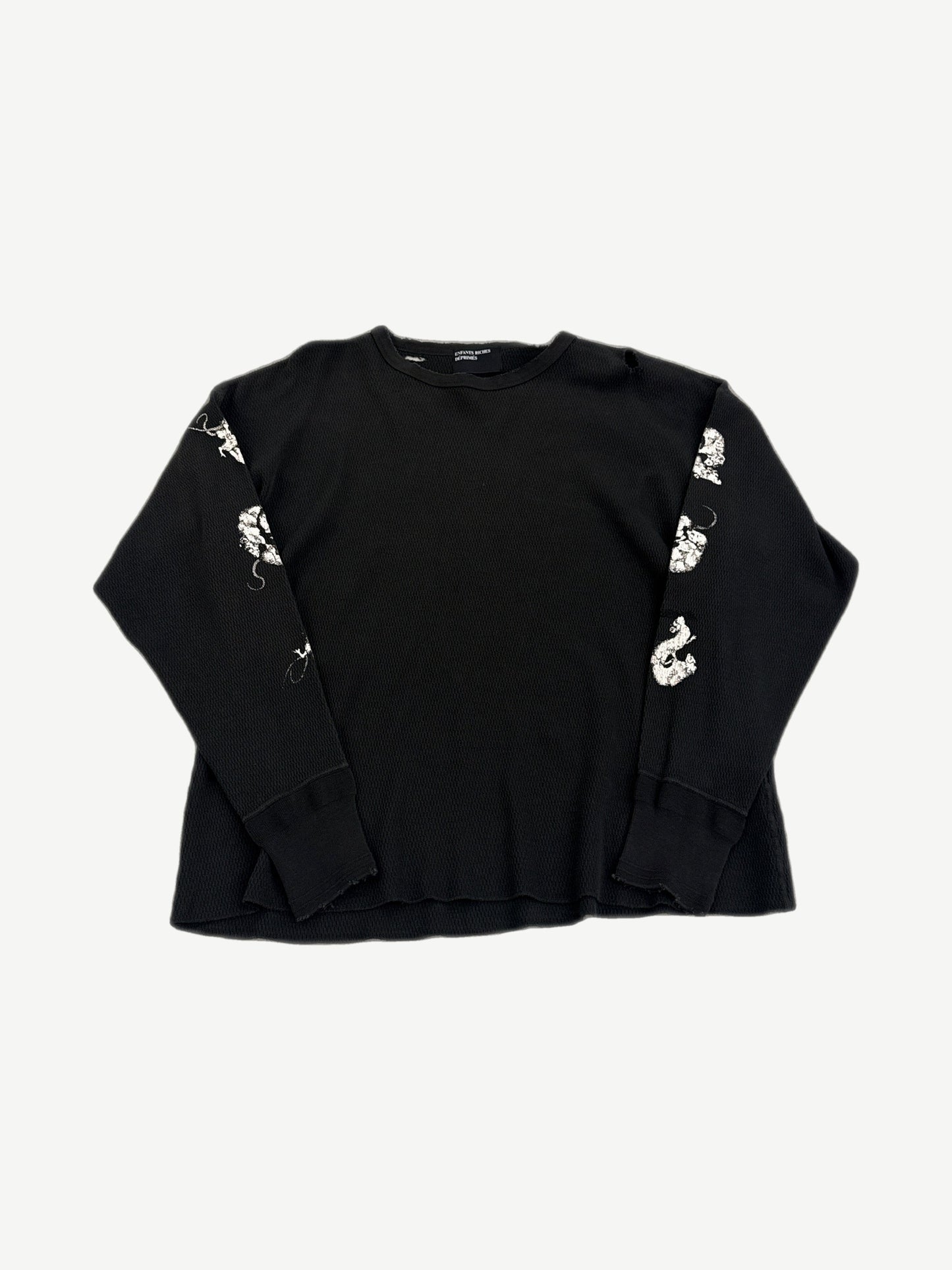 Enfants Riches Deprimes black waffle thermal longsleeve with white skull and rat graphics on the sleeves.