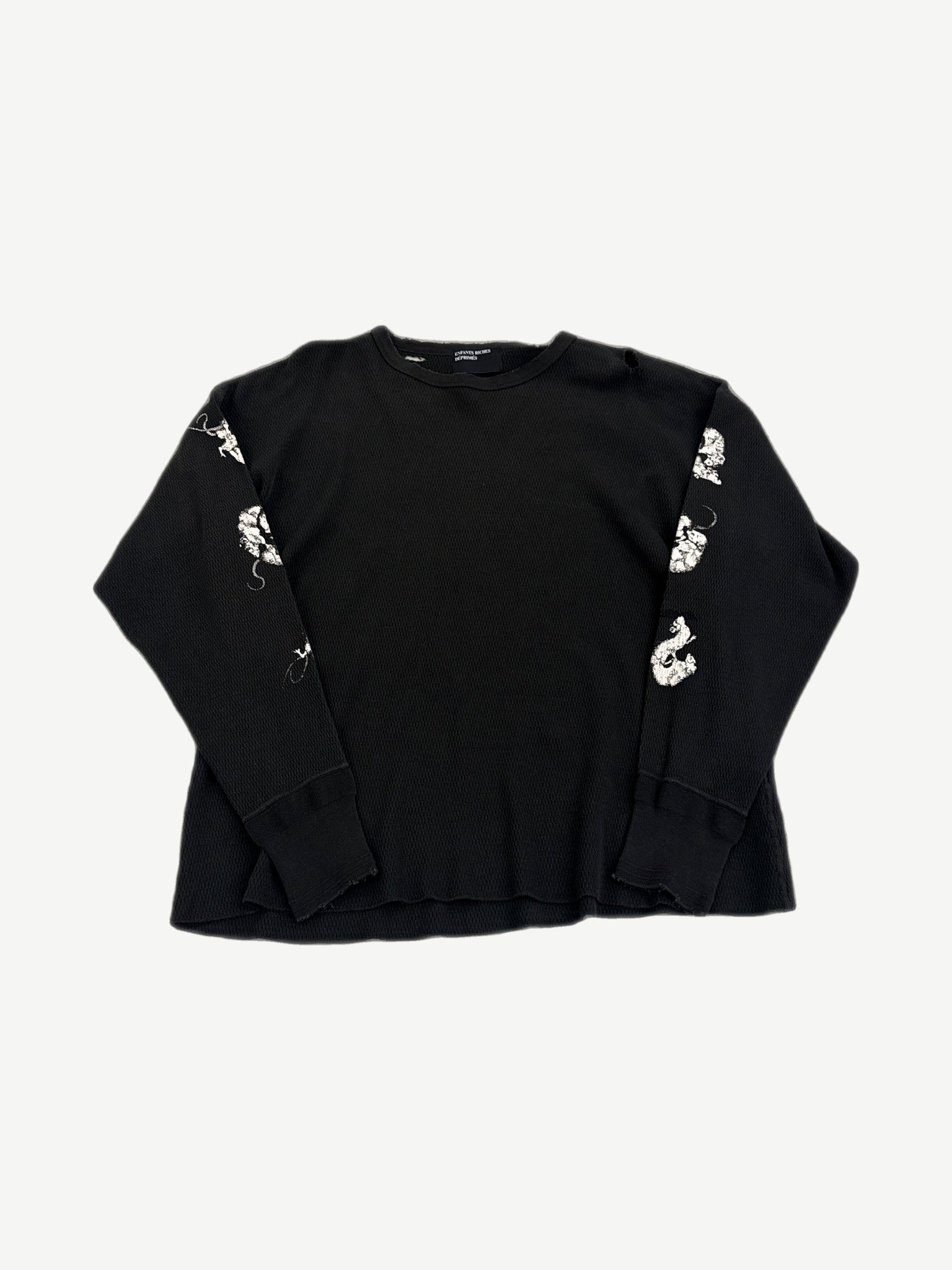 Enfants Riches Deprimes black waffle thermal longsleeve with white skull and rat graphics on the sleeves.