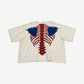 Kapital cream Bone 2 Tone tee back with red ribcage spine and blue scapula bone print graphic.