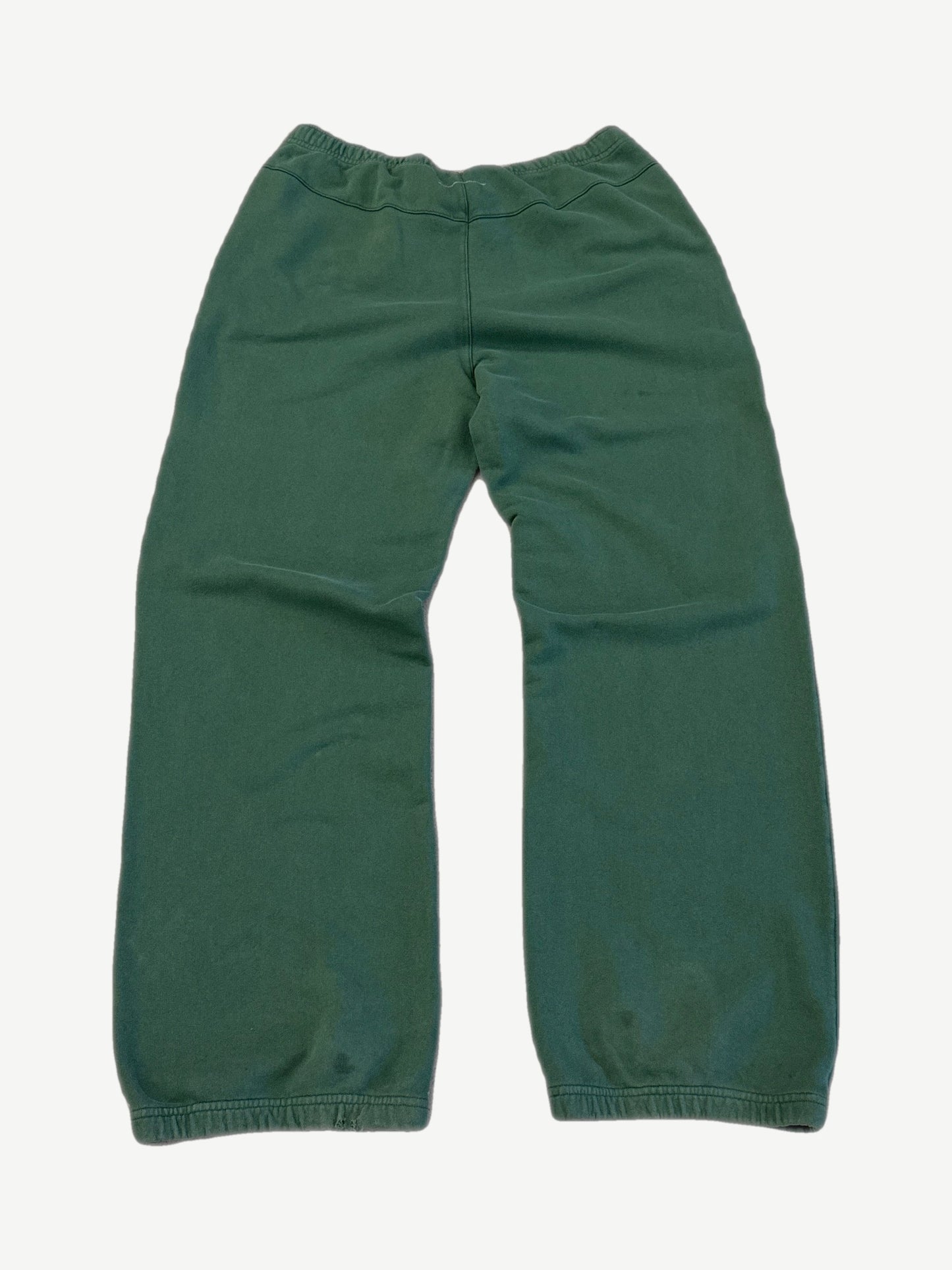 Back of MM6 Maison Margiela green sweatpants with elastic waistband and cuffed straight leg silhouette