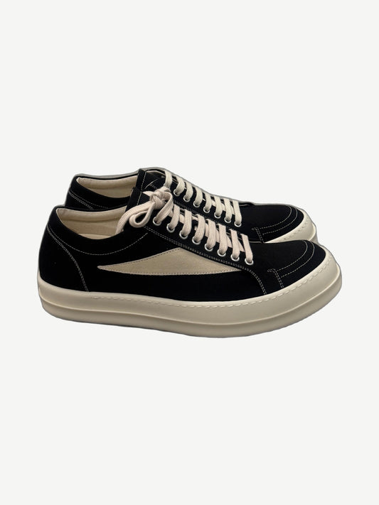 Rick Owens DRKSHDW Vintage low sneakers in black canvas with cream suede side flash and chunky off-white rubber sole.