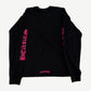 Chrome Hearts black longsleeve tee back with neon pink gothic sleeve lettering and small scroll logo at hem
