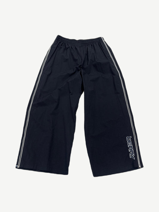 GV Gallery Raspberry Hills black wide-leg track pants front with white piping stripes and Berry leg logo