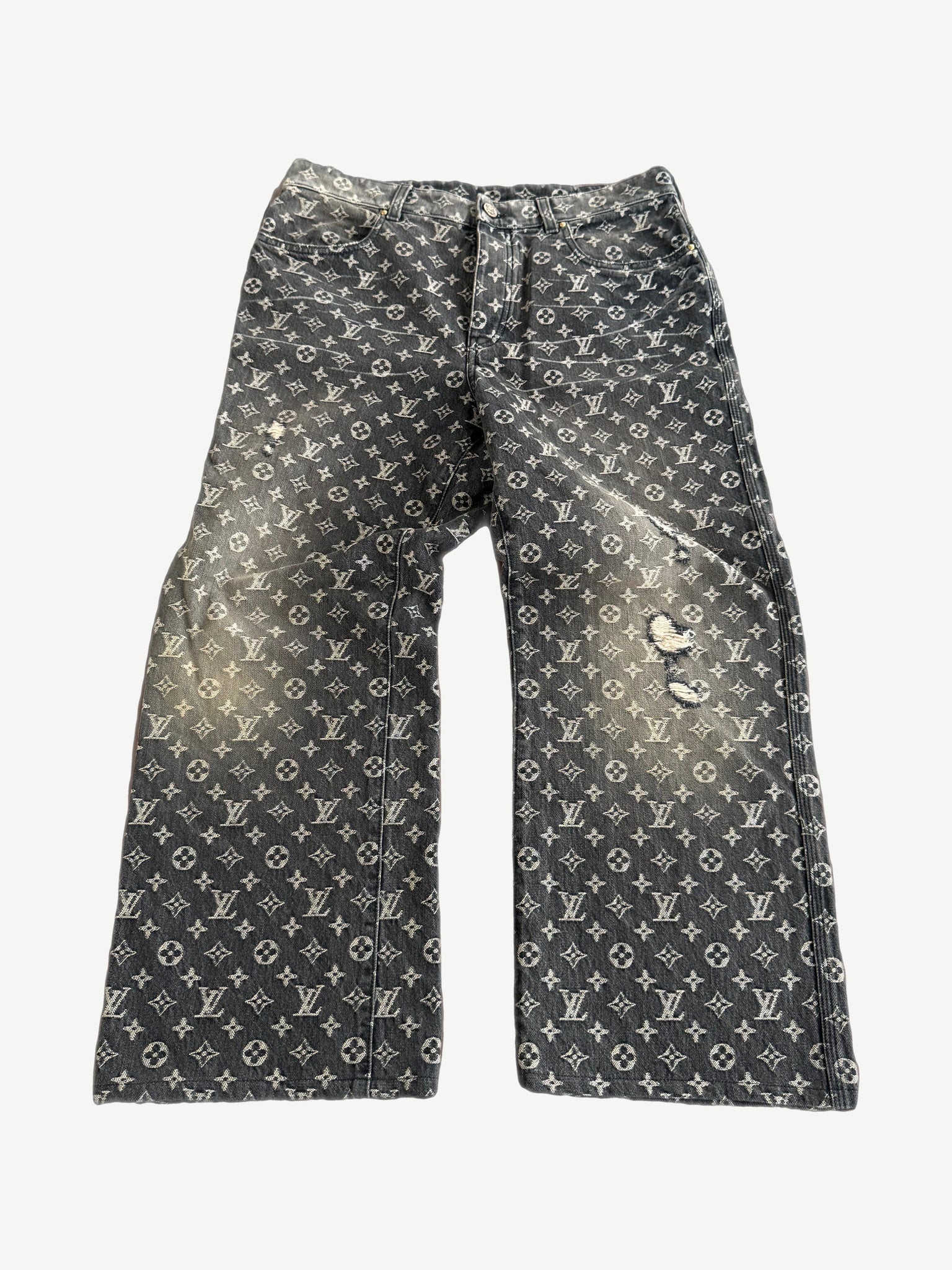 Louis Vuitton black monogram denim pants with tonal allover LV print and straight leg cut, front view