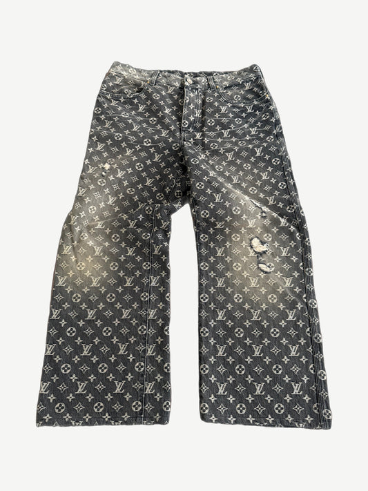 Louis Vuitton black monogram denim pants with tonal allover LV print and straight leg cut, front view