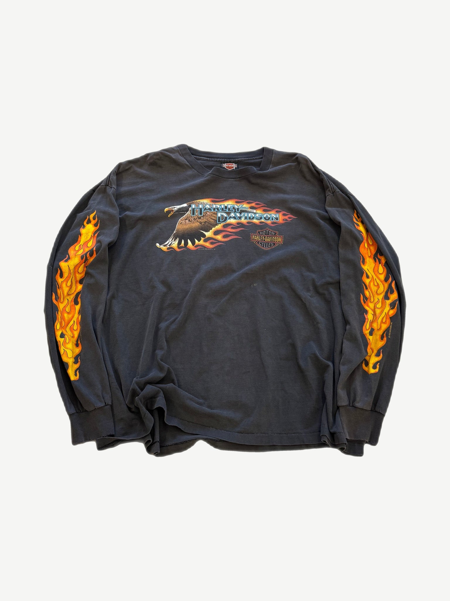 Vintage Harley Davidson black longsleeve with flying eagle chest print and orange flame graphics down both sleeves