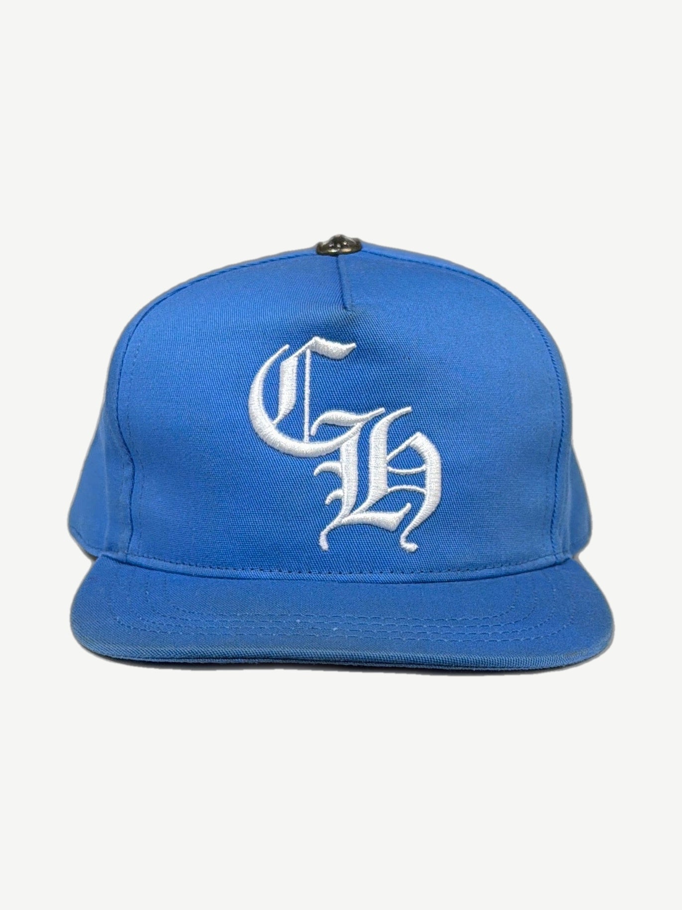 Chrome Hearts light blue baseball cap front with white Old English CH embroidery and silver cross stud.