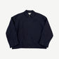 Miu Miu navy pinstripe blouson jacket front, full zip with point collar and tonal embossed miu miu chest logo.