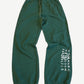 Maison Margiela MM6 forest green relaxed sweatpants with drawstring waist and white MM6 numerical logo print