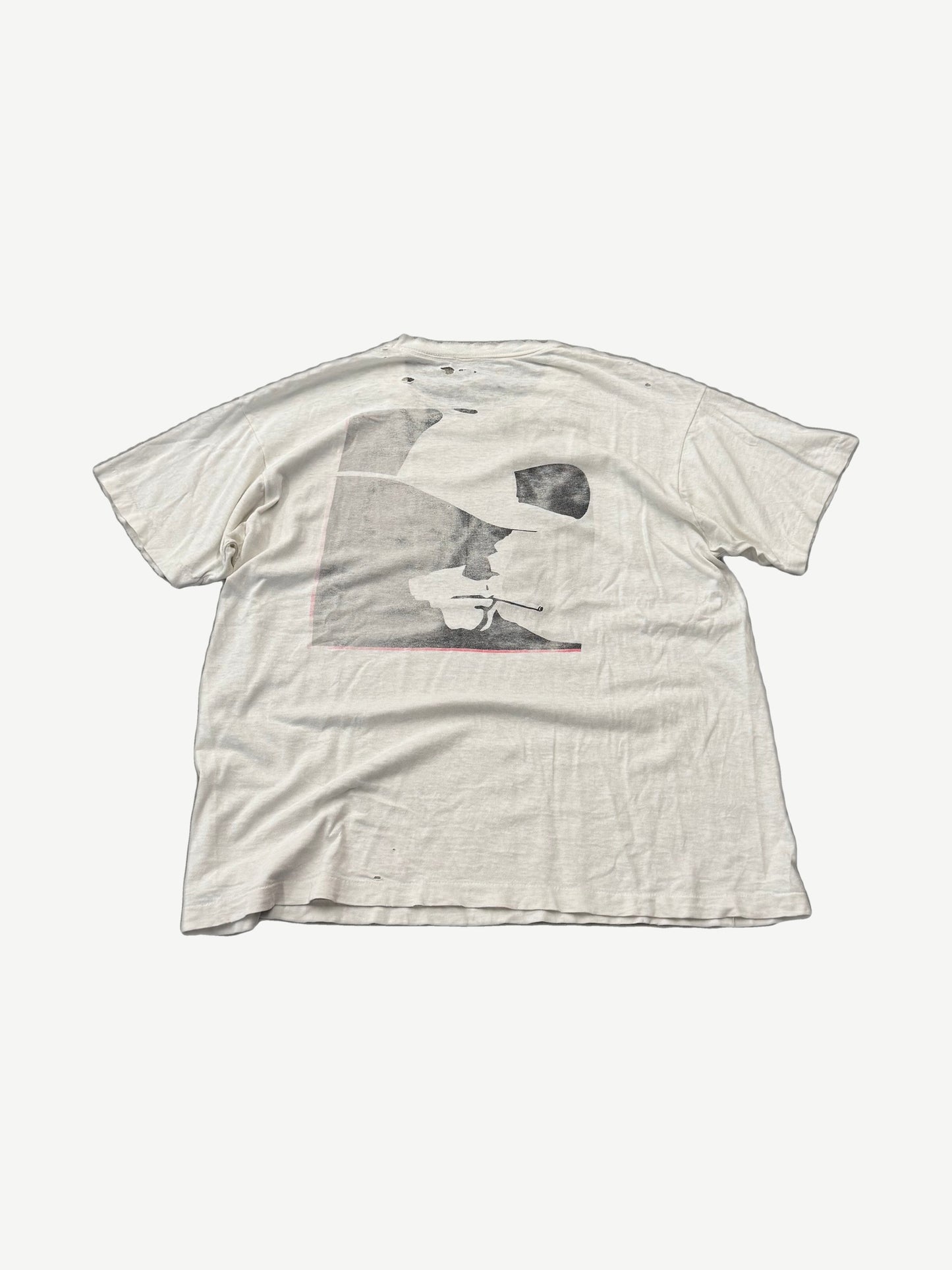 Vintage Marlboro Cowboy Adventure tee back view, distressed white cotton with faded grayscale cowboy graphic.