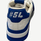 Louis Vuitton blue Trainer sneaker back heel detail with white #54 jersey number on blue leather tab