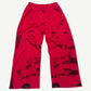 GV Gallery Raspberry Hills red graffiti sweatpants back view with allover dark scribbled print.