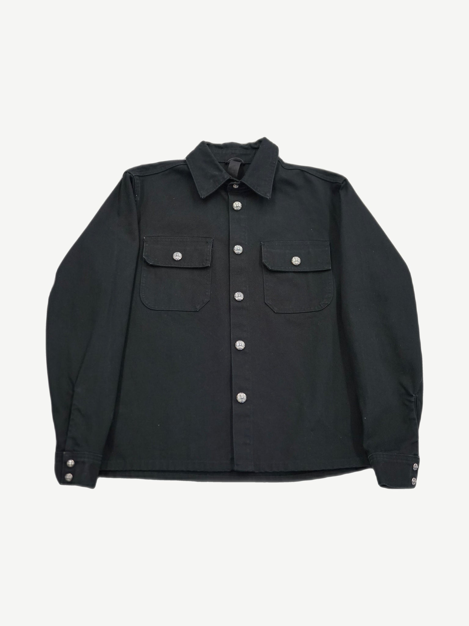 Chrome Hearts black Work Dog jacket front view with silver cross button placket and chest pockets.