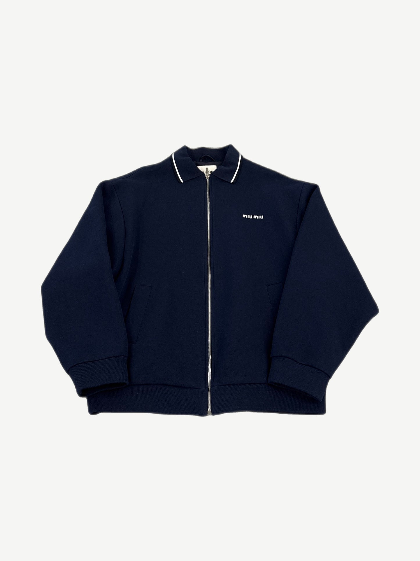 Miu Miu navy piquet blend blouson zip jacket with white-tipped collar and small miu miu chest logo.