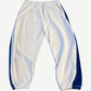 Hidden Season white athletic sweatpants back view with blue side panels and elastic cuffed ankles