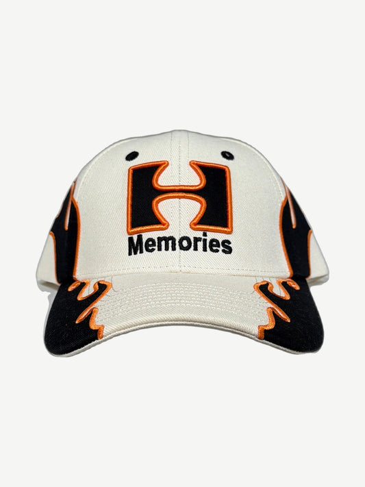 HMDD Happy Memories Don't Die cream snapback hat with embroidered orange flame and Memories script.