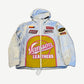 Supreme Vanson Leathers white GORE-TEX shell jacket front with yellow and pink racing sponsor patch graphics