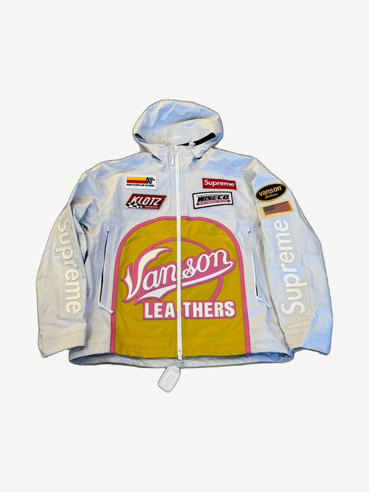 Supreme Vanson Leathers white GORE-TEX shell jacket front with yellow and pink racing sponsor patch graphics