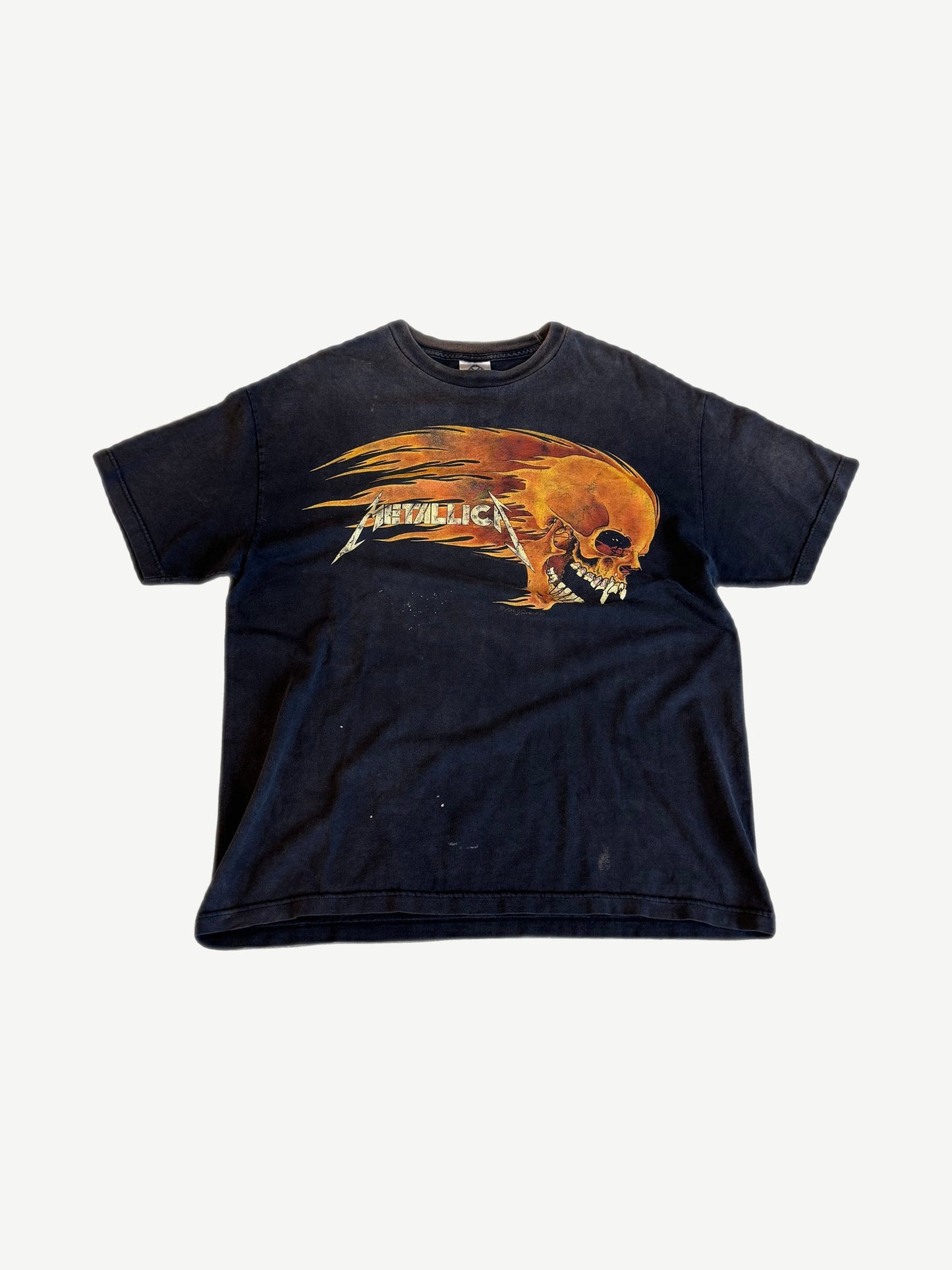Vintage Metallica faded black tee with Pushead flaming skull graphic and silver lightning bolt band logo