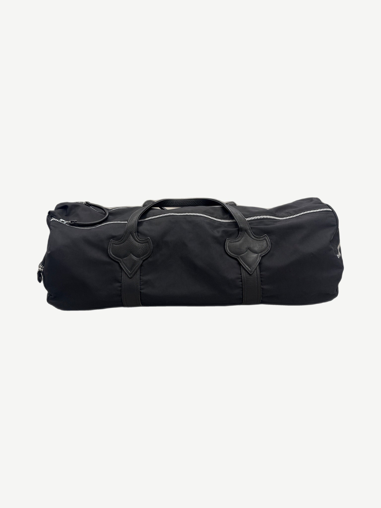 Chrome Hearts black nylon XL barrel duffle bag with dagger leather trim, silver zippers and rolled leather handles