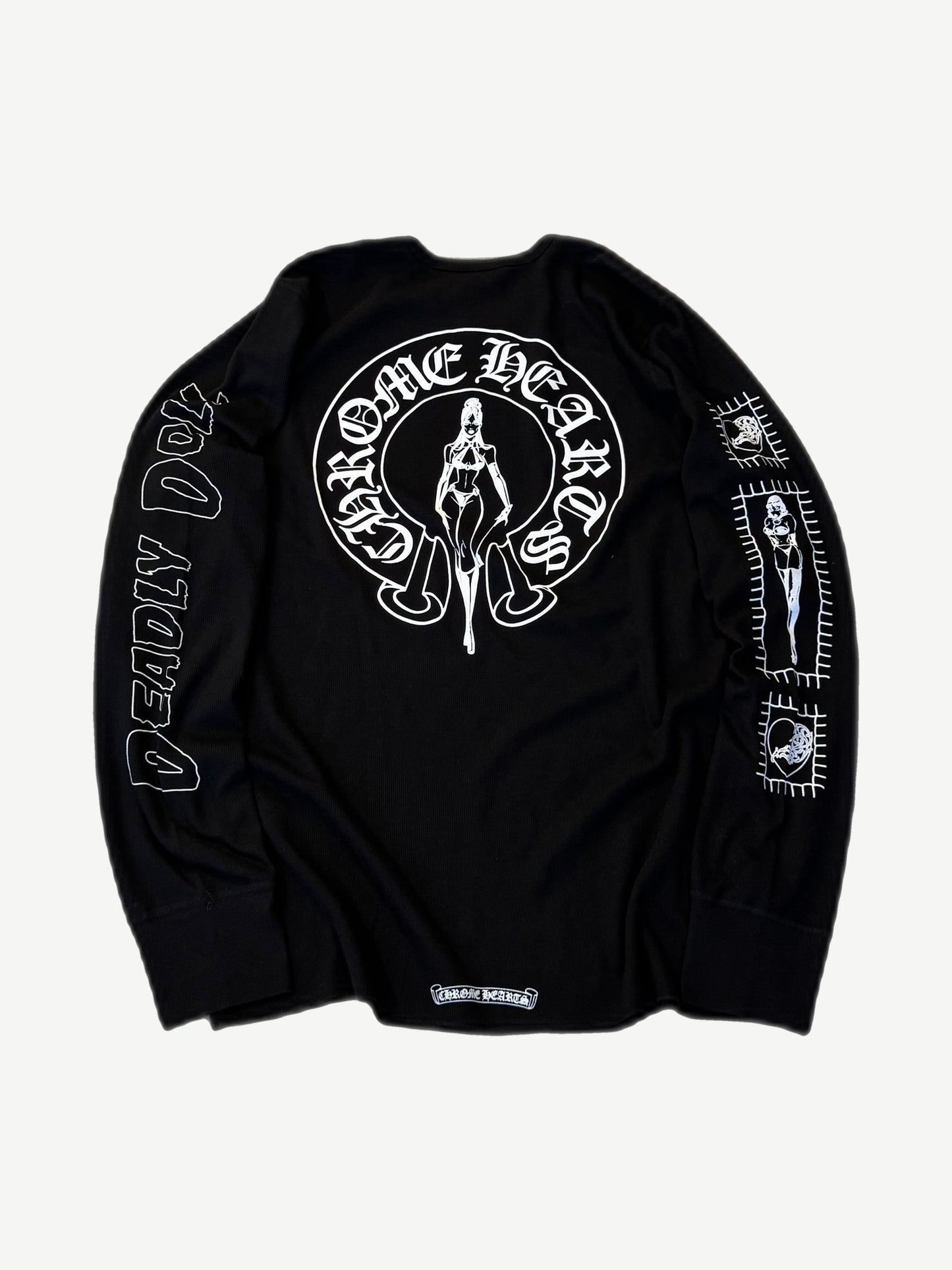 Back of Chrome Hearts Deadly Doll thermal longsleeve with large dagger and pinup artwork in black waffle knit.