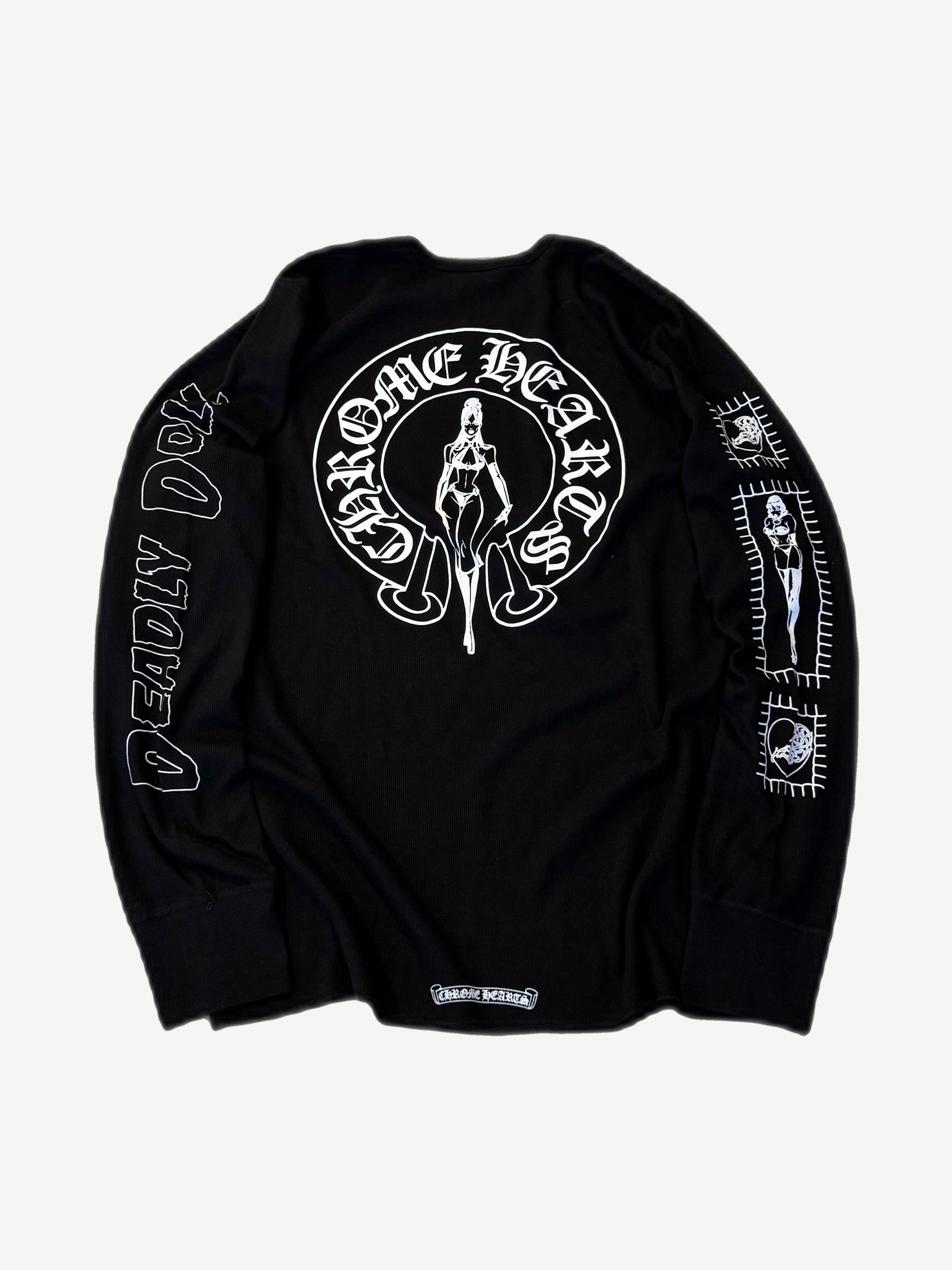 Back of Chrome Hearts Deadly Doll thermal longsleeve with large dagger and pinup artwork in black waffle knit.