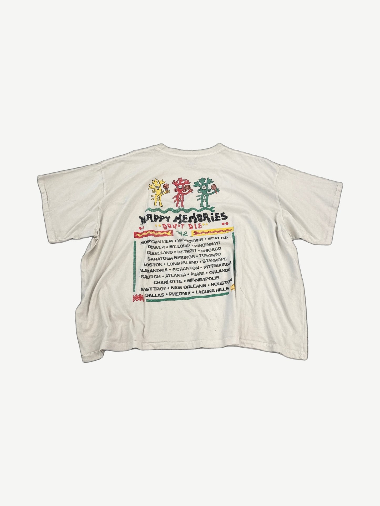 HMDD cream Rasta festival tee back view, faded vintage Rasta-colored back print on natural cotton body.