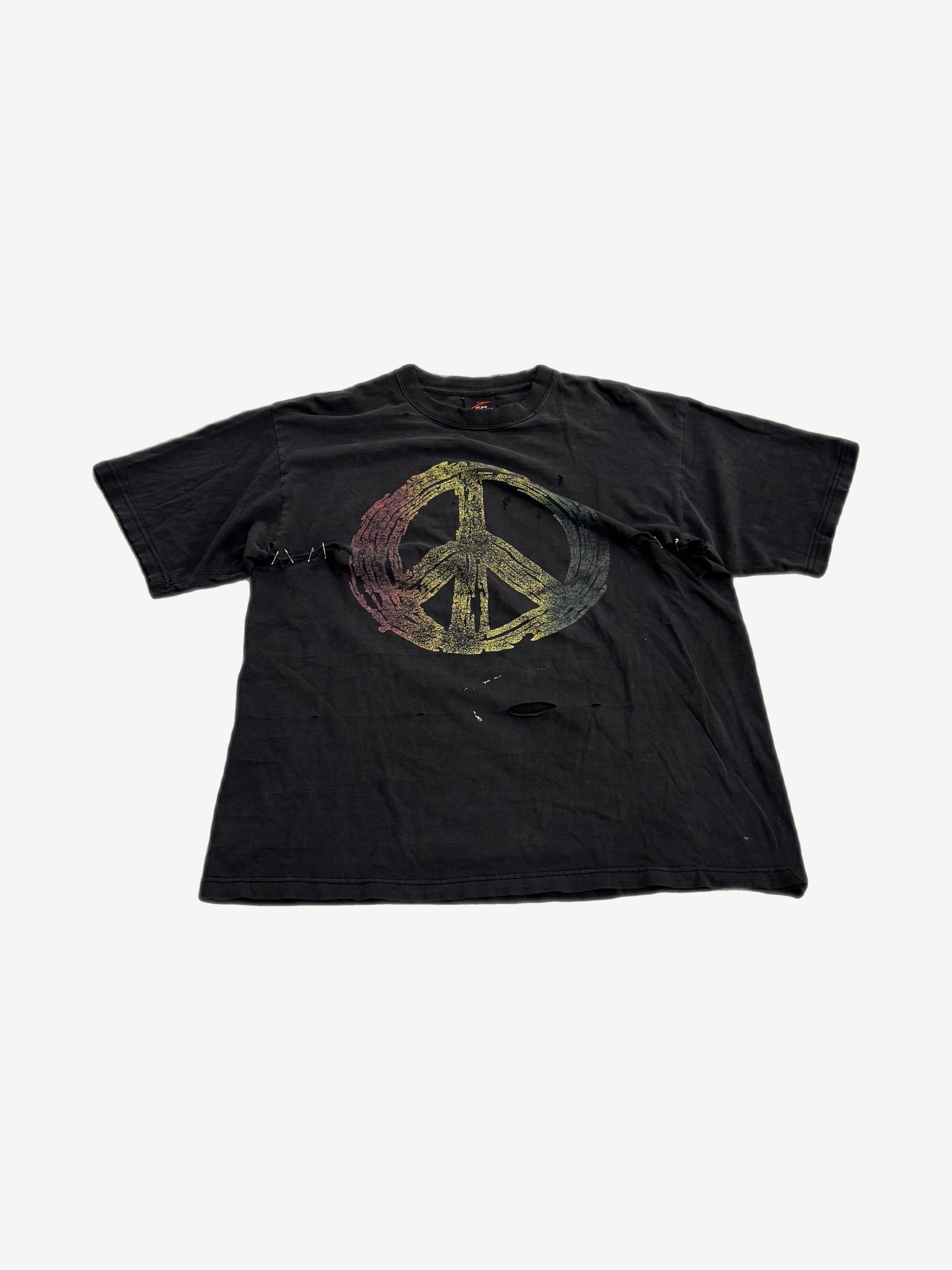 Vintage white tee with green distressed Peace Sign and crayon graphic, anti-gun slogan print on back.