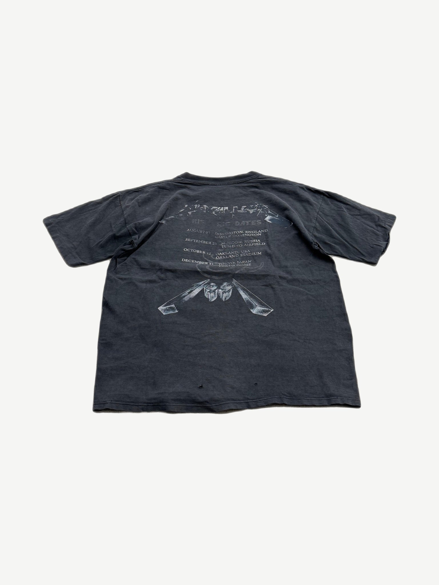 Vintage Metallica faded black tour tee back view with chrome tour date list and coffin graphic