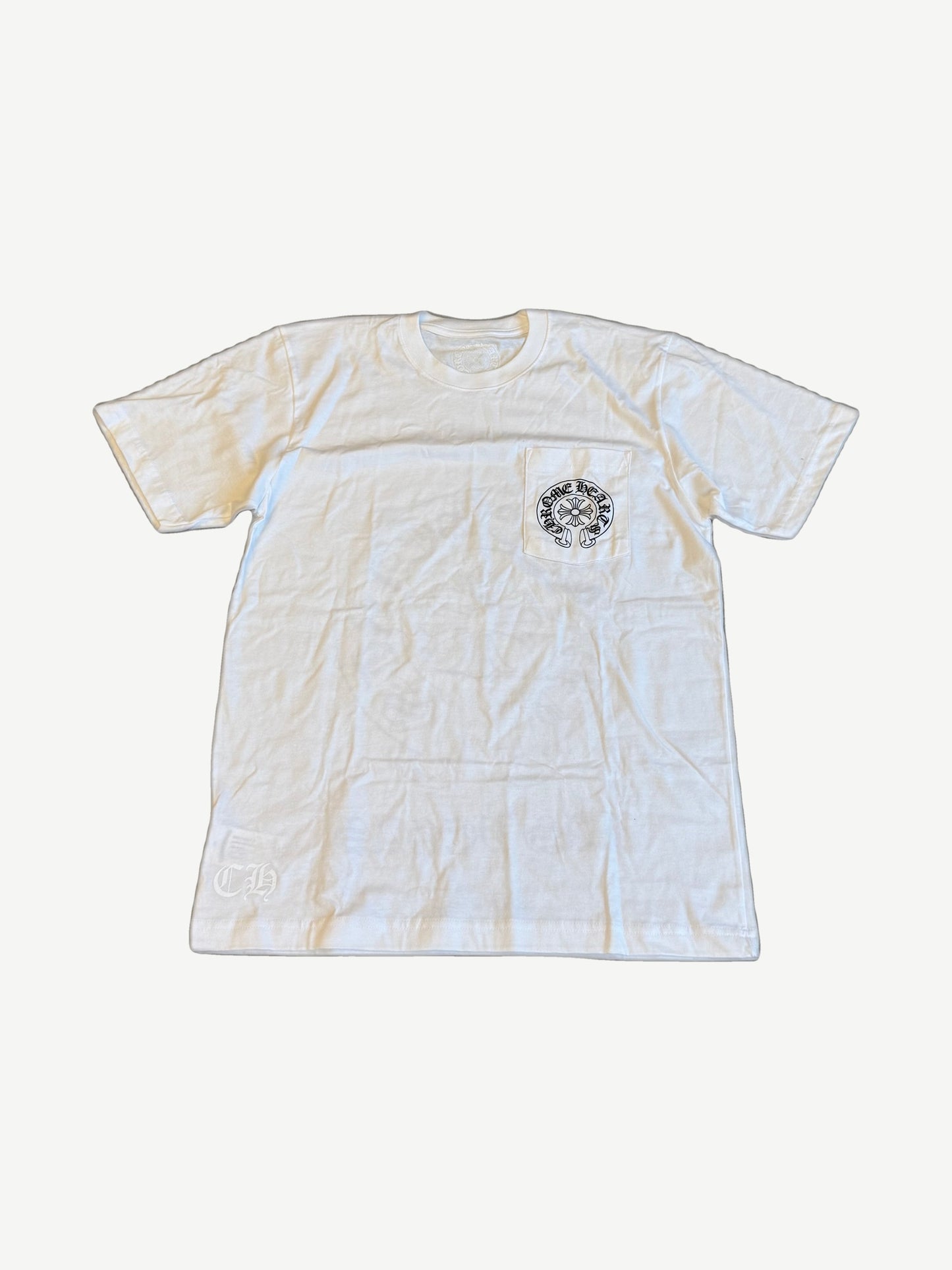 Chrome Hearts white Las Vegas pocket tee front with small horseshoe cross chest print and CH hem