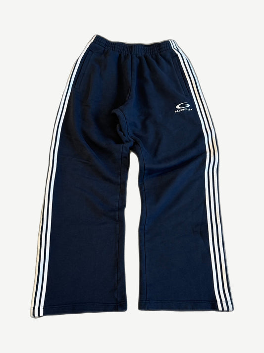 Balenciaga navy baggy sweatpants front with white triple side stripes and Loop Sports Icon swoosh logo
