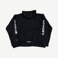 Back of Chrome Hearts 1988 black hoodie with silver metallic Chrome Hearts gothic script along sleeves
