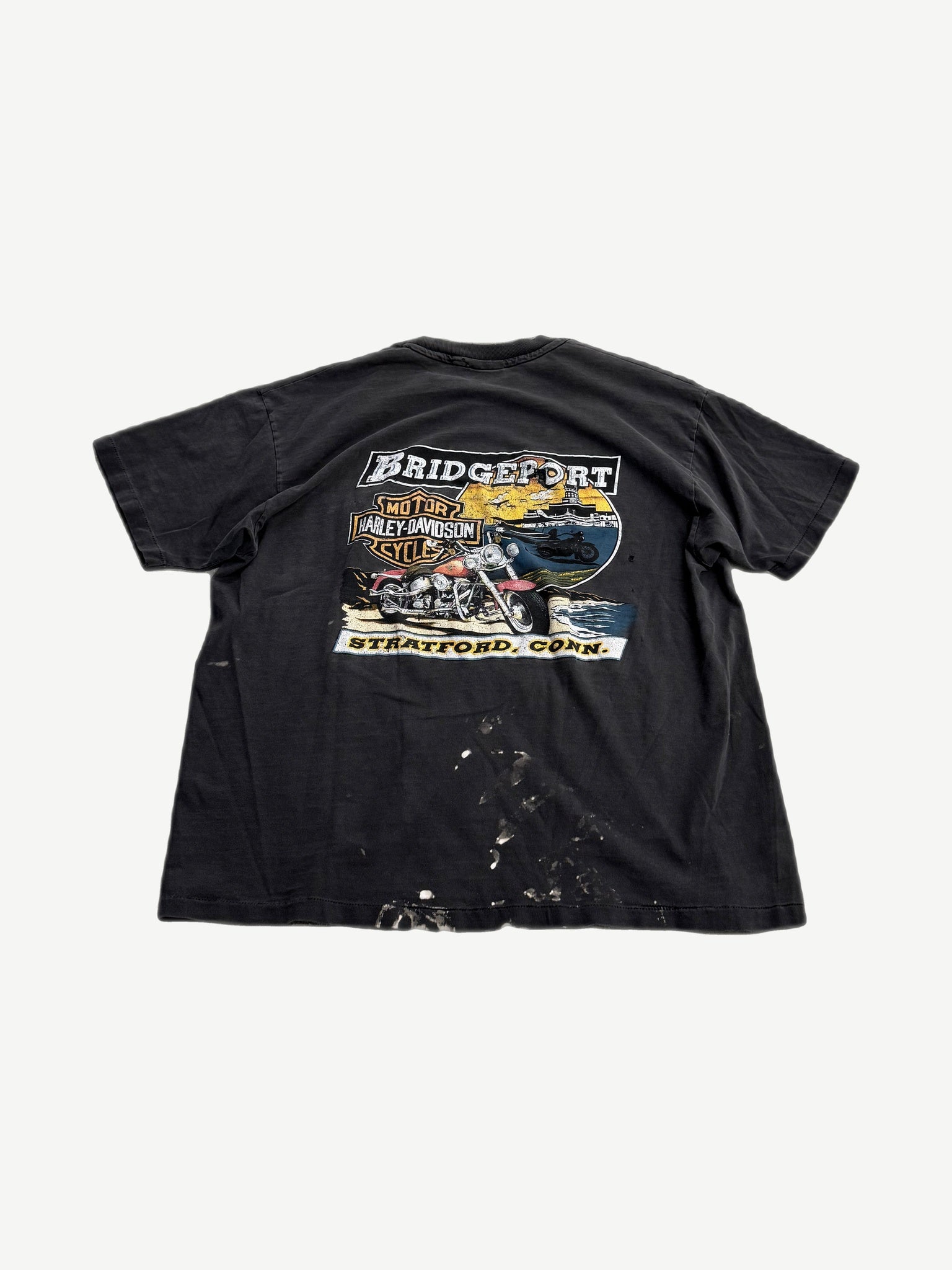 Vintage Harley Davidson Iron Stallion tee back view in faded black with dealership location text.