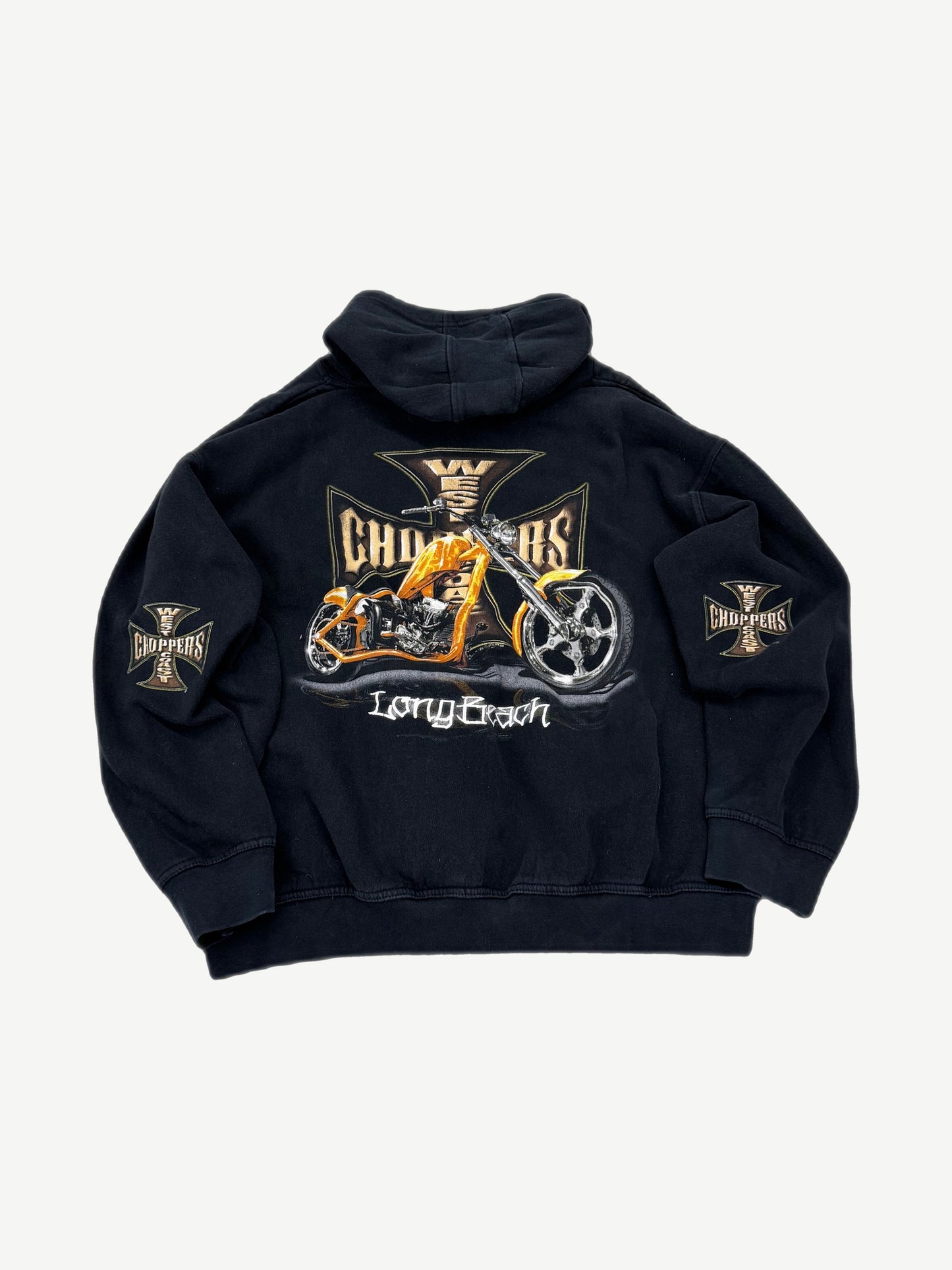 West Coast Choppers black hoodie back graphic showing chopper motorcycle and gothic brand lettering.