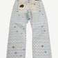Louis Vuitton Tyler the Creator monogram denim jeans, back view with LV monogram weave and five-pocket cut.
