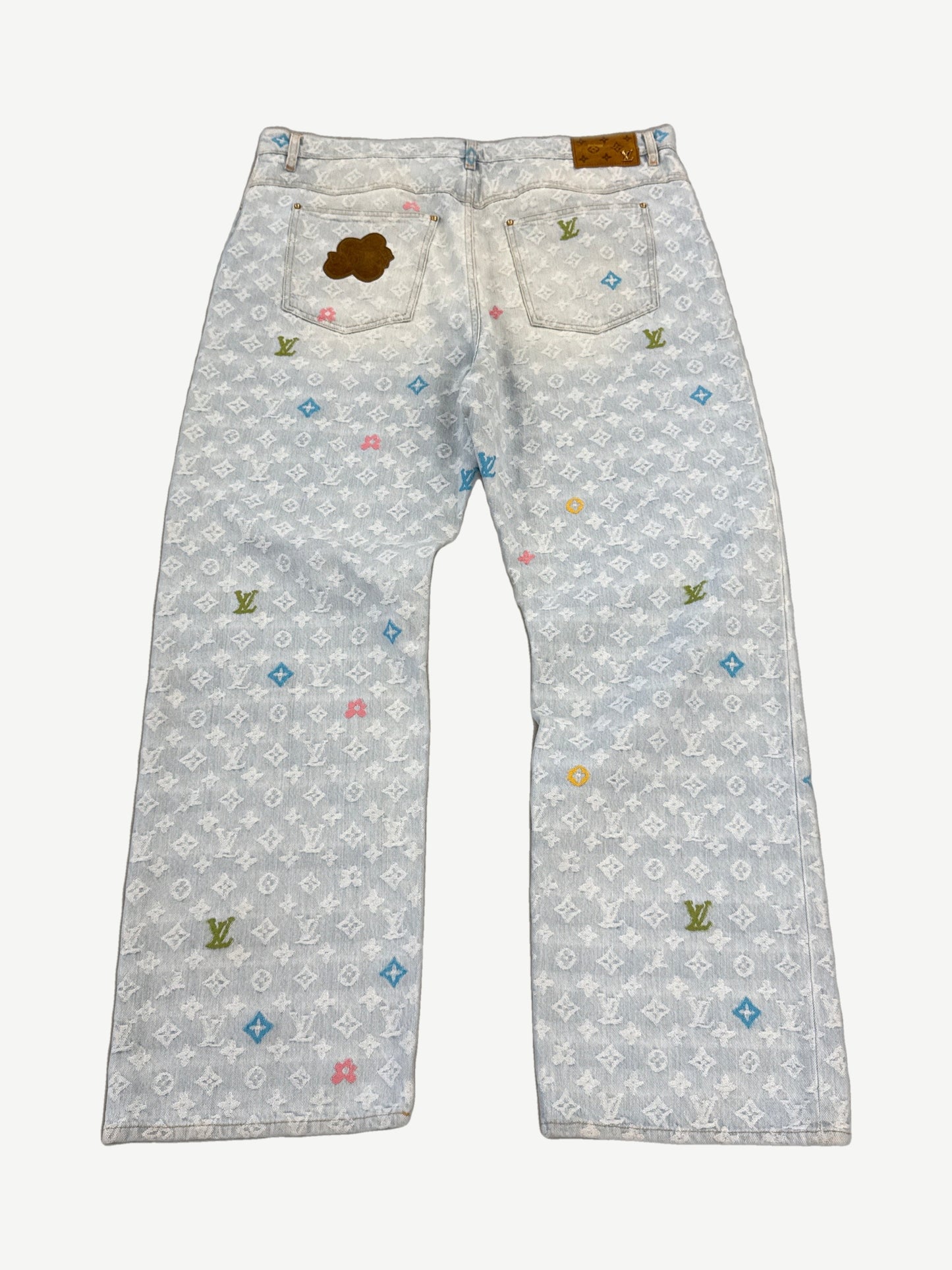 Louis Vuitton Tyler the Creator monogram denim jeans, back view with LV monogram weave and five-pocket cut.