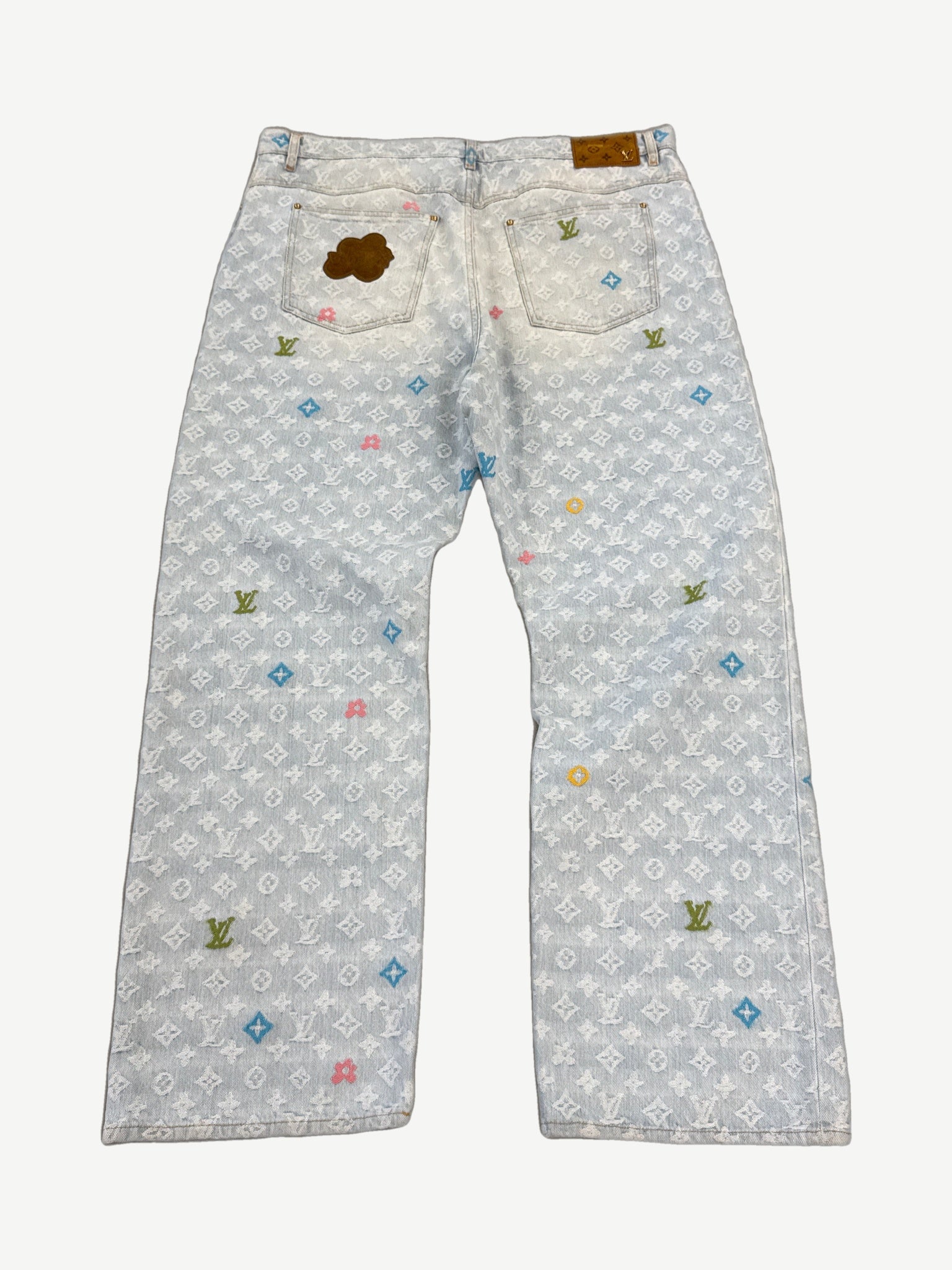 Louis Vuitton Tyler the Creator monogram denim jeans, back view with LV monogram weave and five-pocket cut.