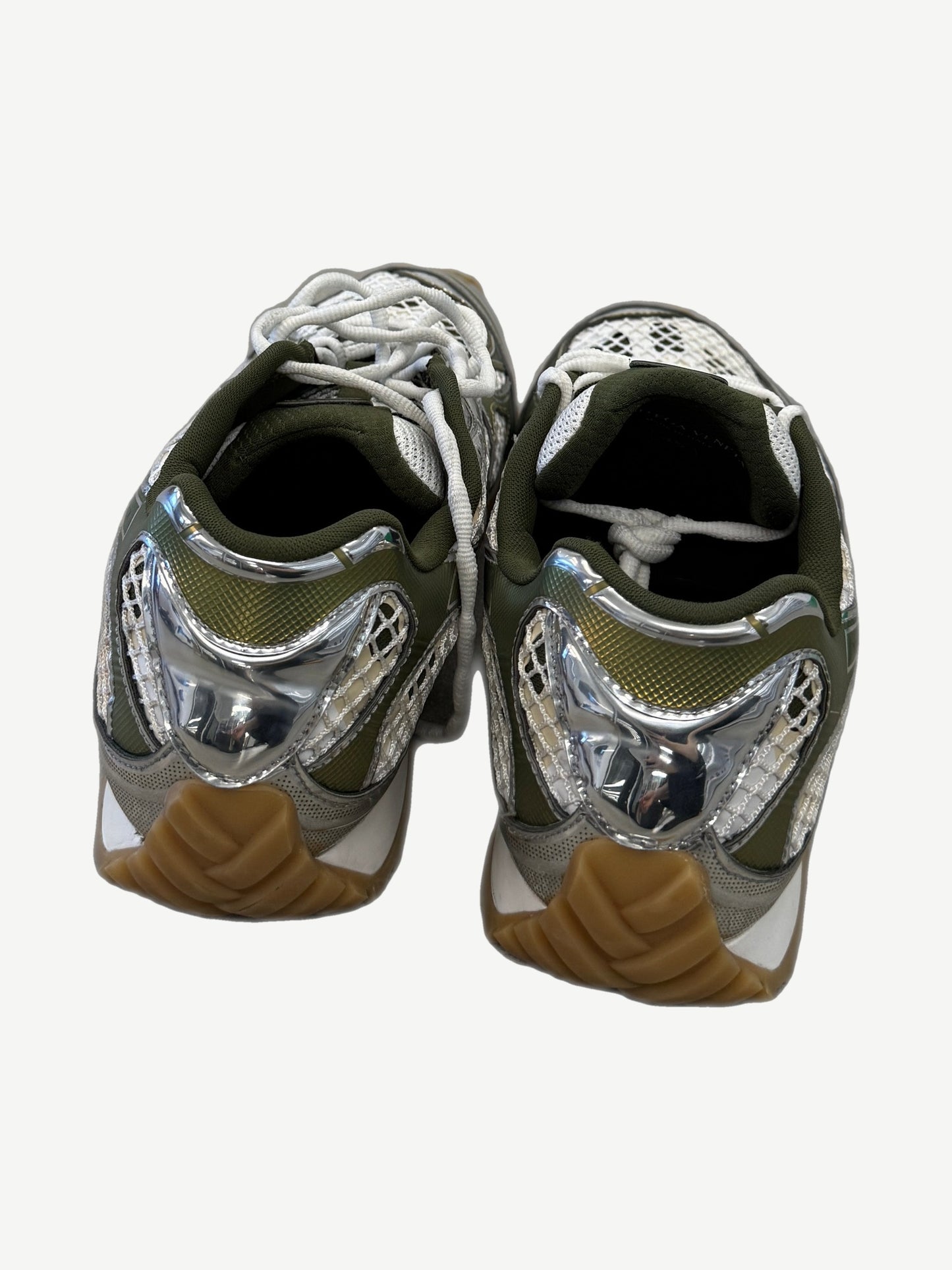 Bottega Veneta Orbit sneakers heel view showing chrome silver heel counters with olive mesh panels