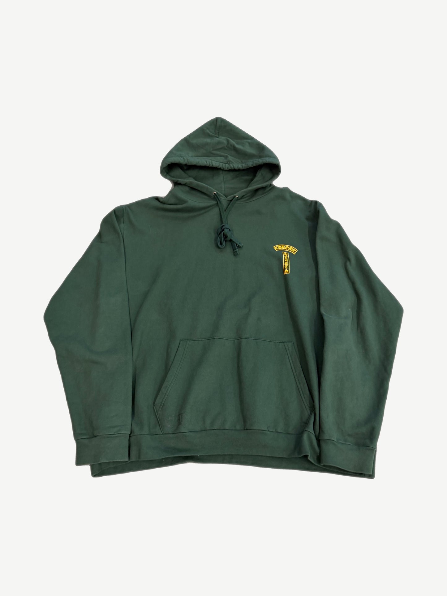 Chrome Hearts green T-Bar hoodie with orange Chrome Hearts horseshoe chest emblem and cross sleeve graphics.