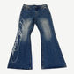 GV Gallery Raspberry Hills Miley Cyrus flare jeans in faded blue denim with flared leg and back graphic