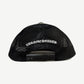 Chrome Hearts black trucker hat back showing white embroidered gothic logo banner and snapback closure