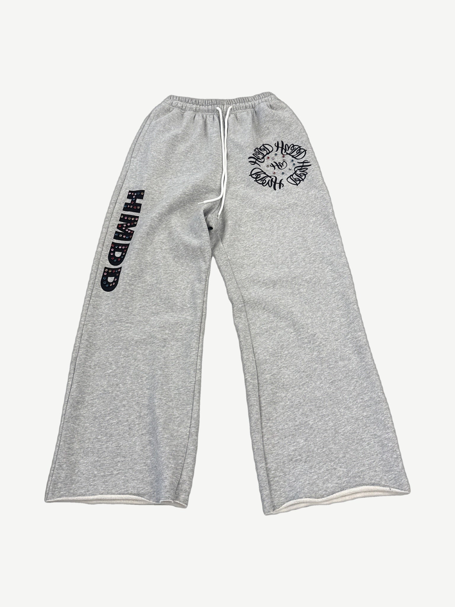 HMDD gray sweatpants with studded HMDD leg graphic and clustered circular logo emblems down the thigh.