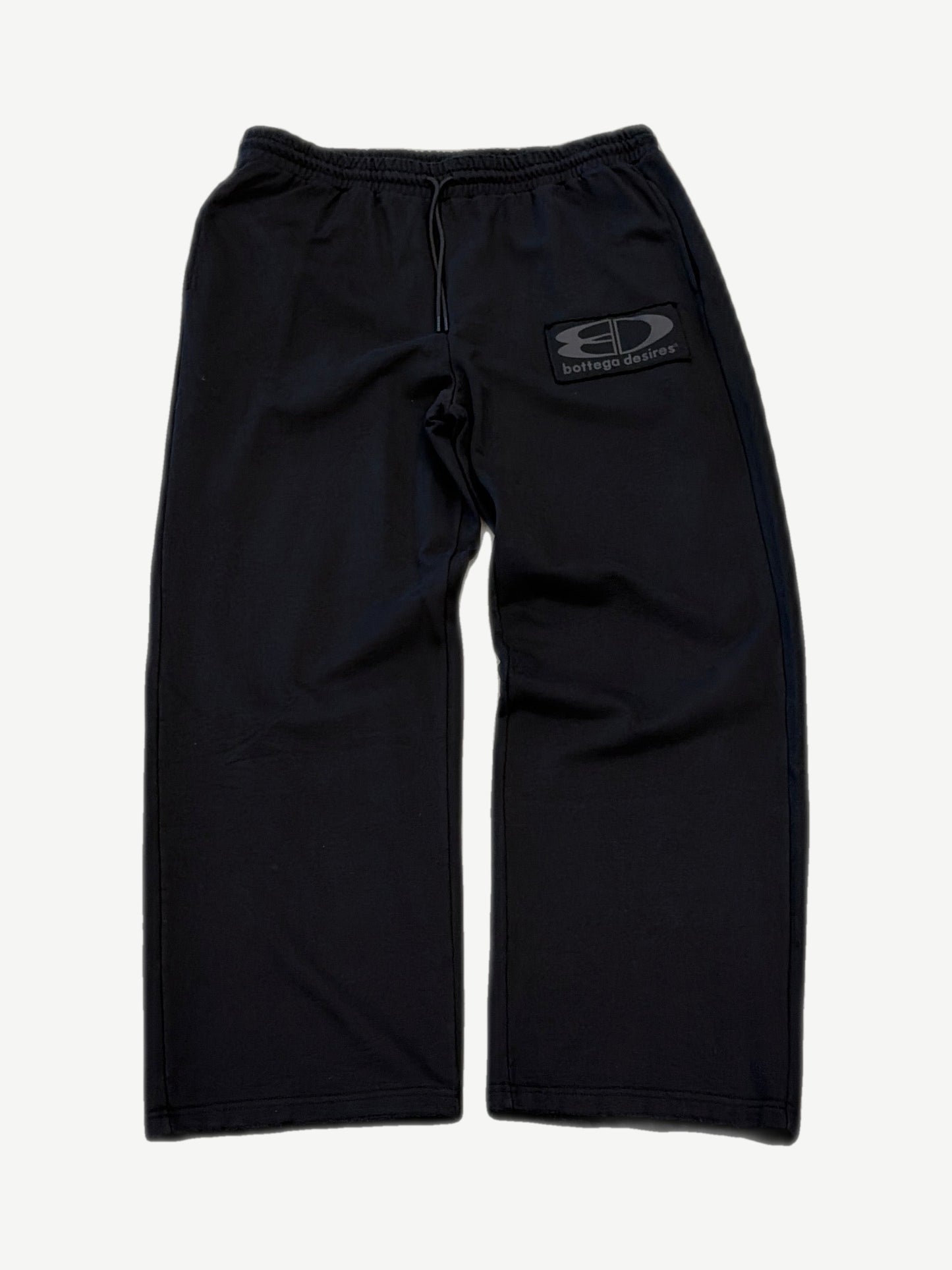 Bottega Desires black tech sweatpants, slim tapered fit in matte technical nylon with elastic drawstring waist.