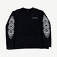 Chrome Hearts black crewneck front, purple dagger and floral graphics layered with eyechart text