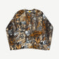 Chrome Hearts Nike NOCTA Drake crewneck front in real tree camo with allover orange dagger and cross print