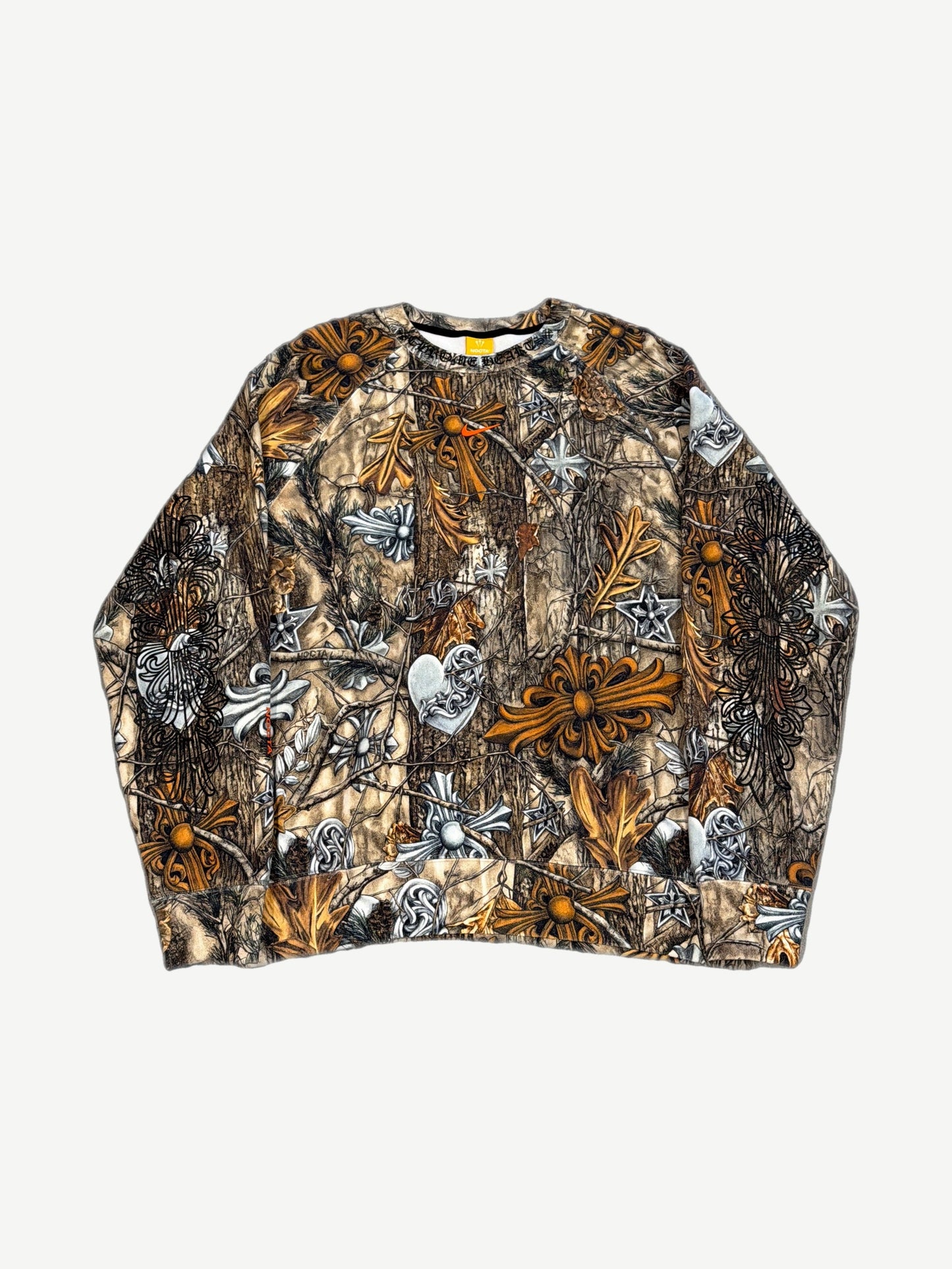 Chrome Hearts Nike NOCTA Drake crewneck front in real tree camo with allover orange dagger and cross print